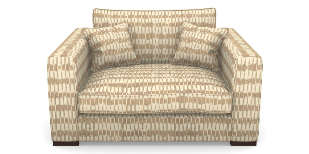 Product photograph of Stourhead Snuggler In V A Brompton Collection - Ikat - Assam Tea from Sofas and Stuff Limited